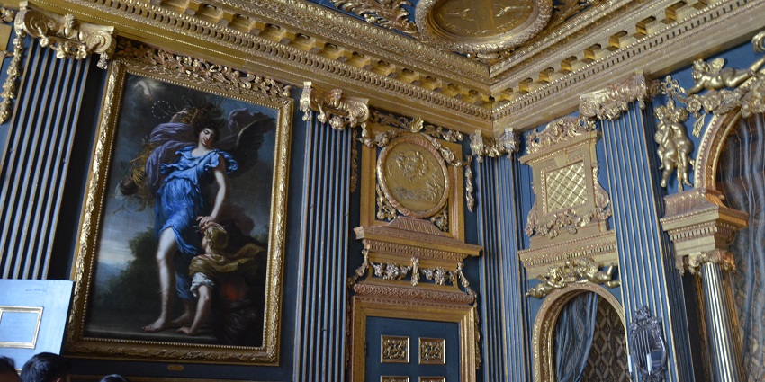 An image showing the elegant interior of Drottningholm Palace, highlighting its royal charm.