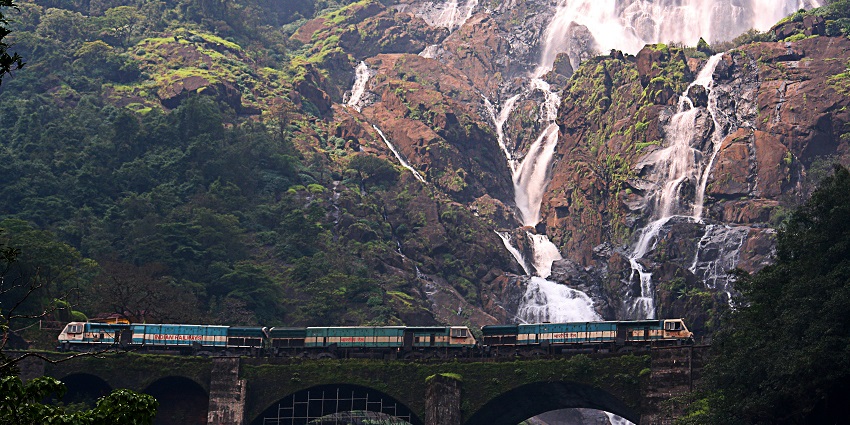 An image of the three-tiered flow of Dudhsagar Falls, capturing its water streams