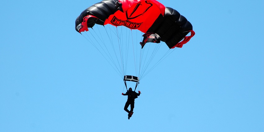 Skydiving in the UK over historic Durham, with stunning aerial views of castles, cathedrals, and picturesque rural landscapes.