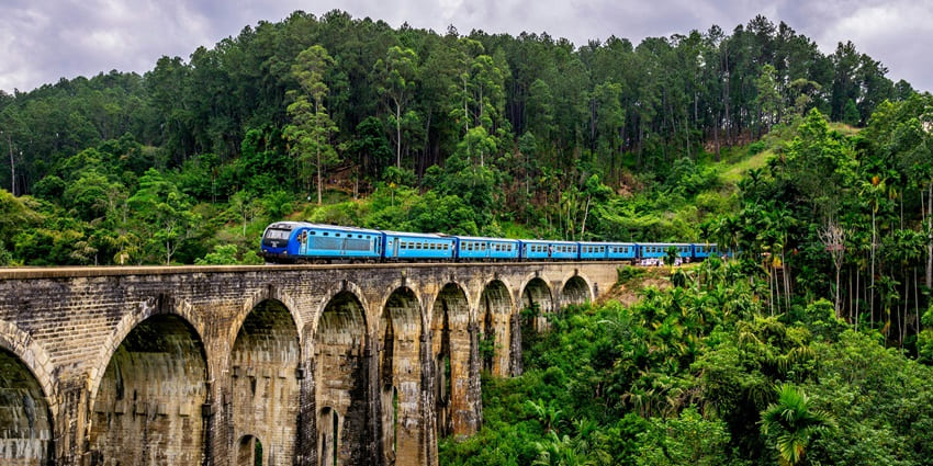 A view of hills covered with clouds and mist in Ella, a prominent hill station in Sri Lanka.