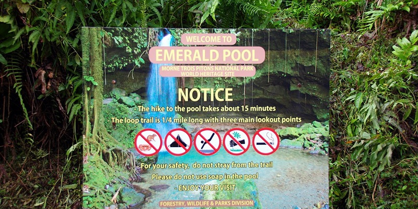 Sign of the Emerald Pool giving information about the trial length and hike time.