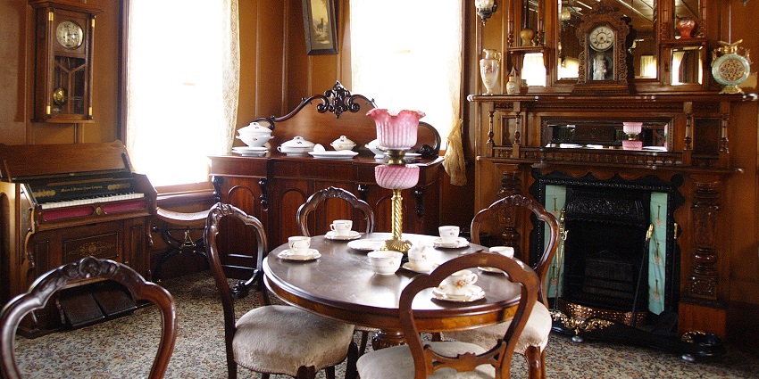 Traditional tea with scones and pastries.