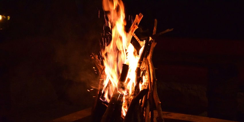 Enjoying a bonfire near a lakeside is one of the top things to do at Damdama Lake.