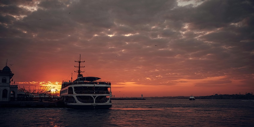 Sail into the horizon with breathtaking sunset views over tranquil ocean waters.