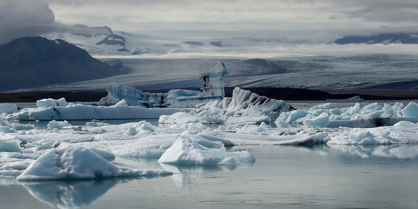 An image of a glacier that looks similar to the Eqi Glacier, a famous place to visit in Greenland.