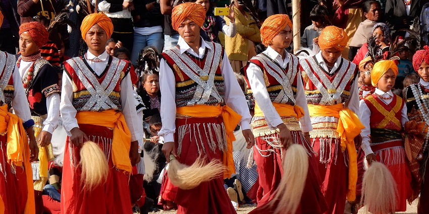 A picture of a traditional Nongkrem Dance Festival near the lake.
