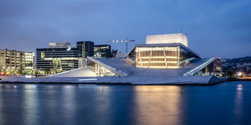 An image of Oslo Opera House, an iconic Oslo music venue known for its impressive architecture