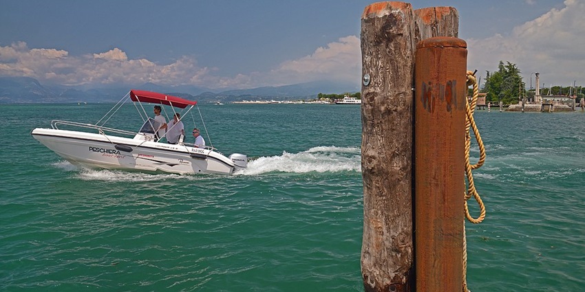 Enjoy boating in Italy lakes as one of the best things to do in Italy in August this year.