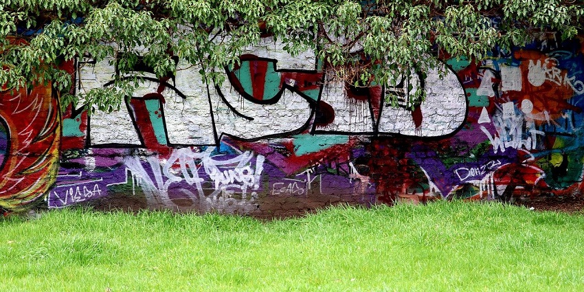 An image showing vibrant street art and painting, showcasing creative urban expression.