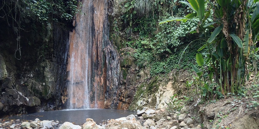 Walk through colourful gardens with waterfalls and hot springs.