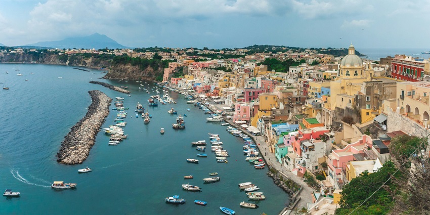 An amazing aerial view of Procida, a vibrant and amazing place in Naples for travellers.