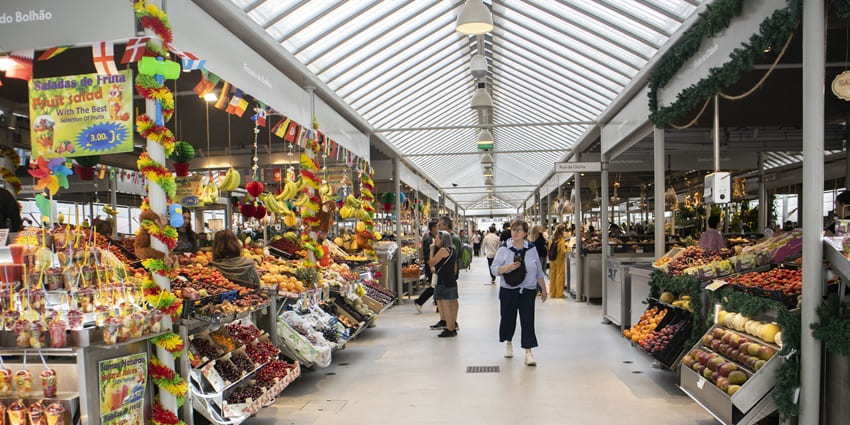 A vibrant scene inside Mercado do Bolhão, one of the things to do in Porto, Portugal.