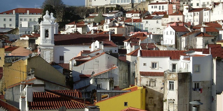 Walking around the streets of Alfama is one of the fun things to do in Lisbon, Portugal.
