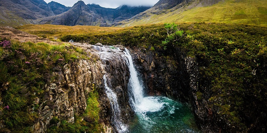 Things to do in Scotland include Magical waterfalls under starlit skies in Isle of Skye.