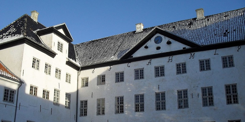 An image of Dragsholm Slot, a famous tourist destination to visit in Denmark.