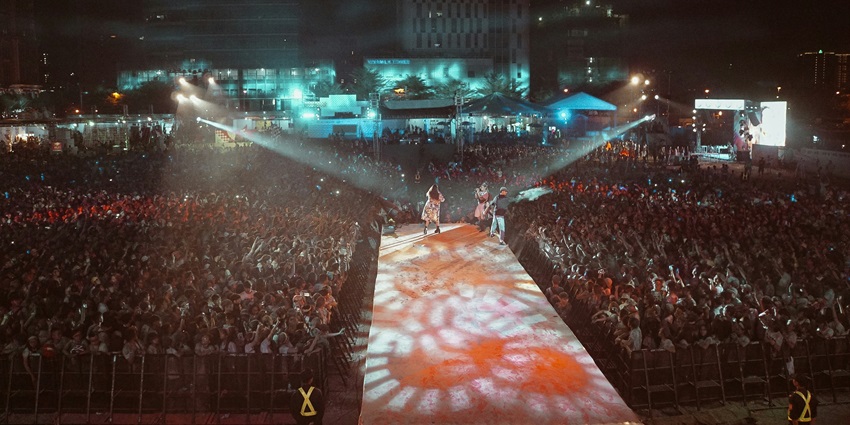 A huge crowd enjoying the music in the concert ground in a Valencia Music Festival.