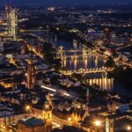 An image showing Frankfurt Main city centre at night, showcasing Frankfurt nightlife.