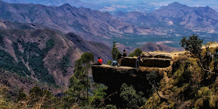 A picture captured from Dolphin’s Nose rock formation with couples enjoying the misty vistas.