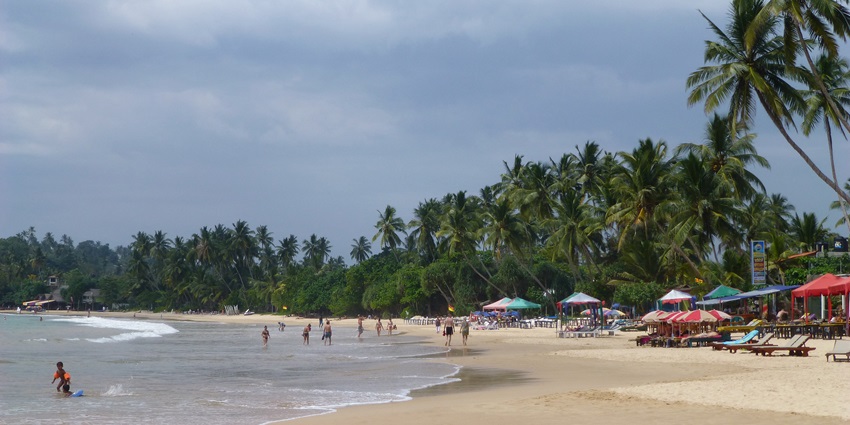 Tourists enjoy the beautiful Mirissa Beach located in Sri Lanka’s Southern Province.