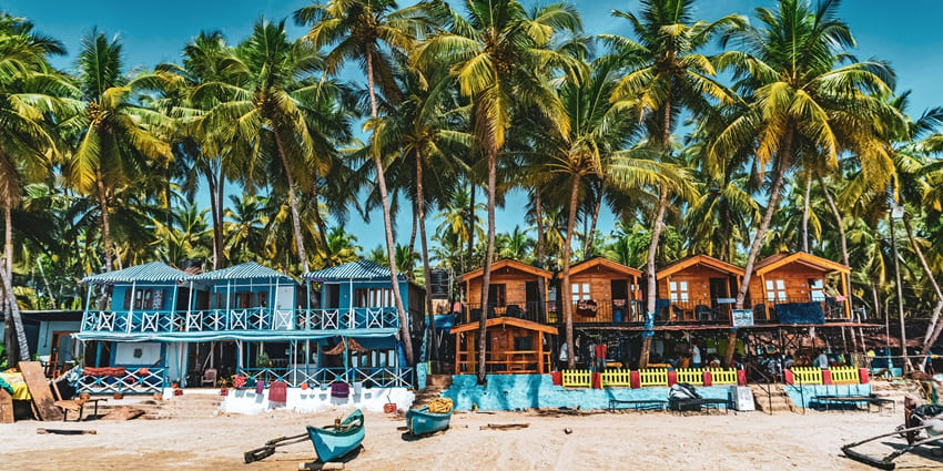 An image showing the vibrant shoreline of Goa's Baga Beach, known for its lively atmosphere.