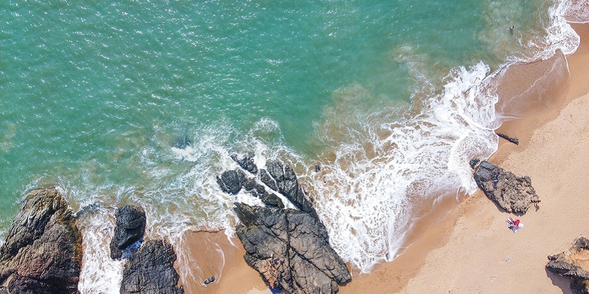 Serene waters of the Gokarna Beach in Gokarna, coastal town in Karnataka, India