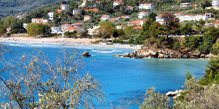 A mesmerising view of Golden Beach featuring shimmering waters and a coastal town