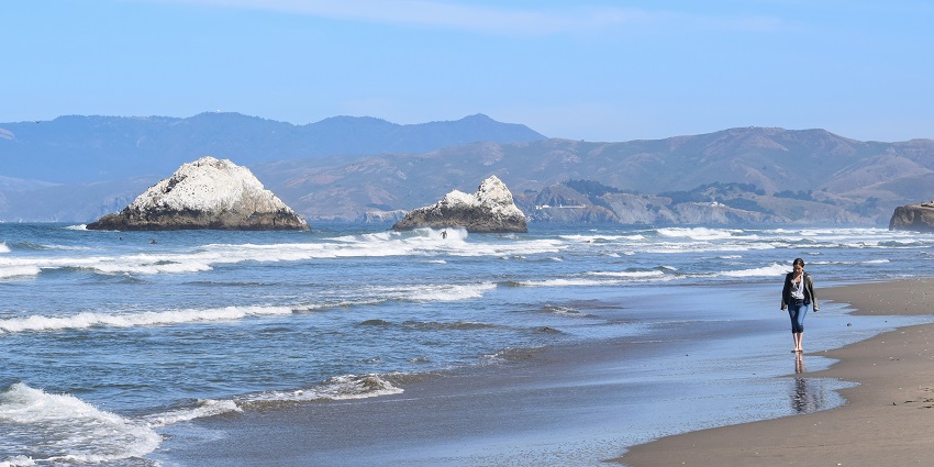 Quiet beach with golden sands, ideal for relaxation and exploration.