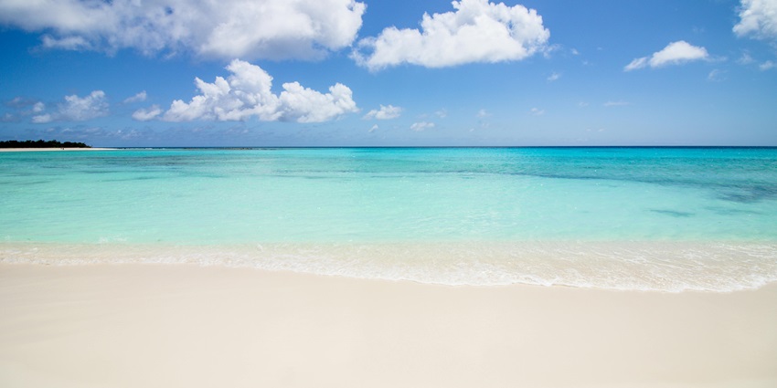 Grand Barbe Beach is a remote, white-sand beach in Seychelles that is a scenic gem.