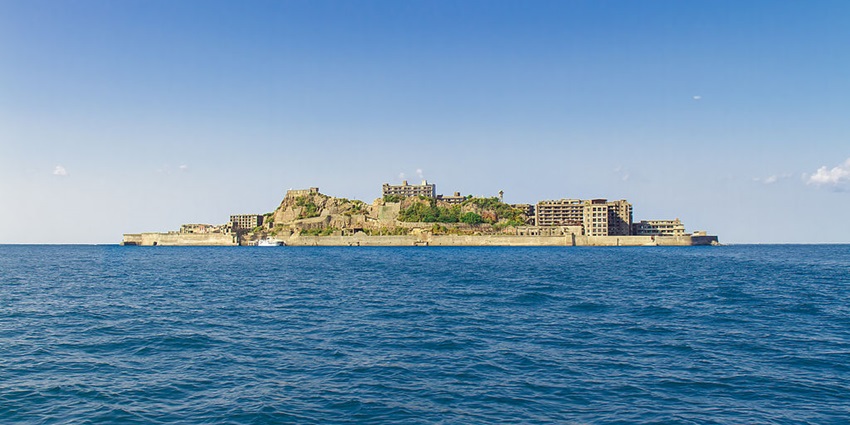 A mysterious and desolate view of Gunkanjima, Japan’s famous ghost island in the sea.