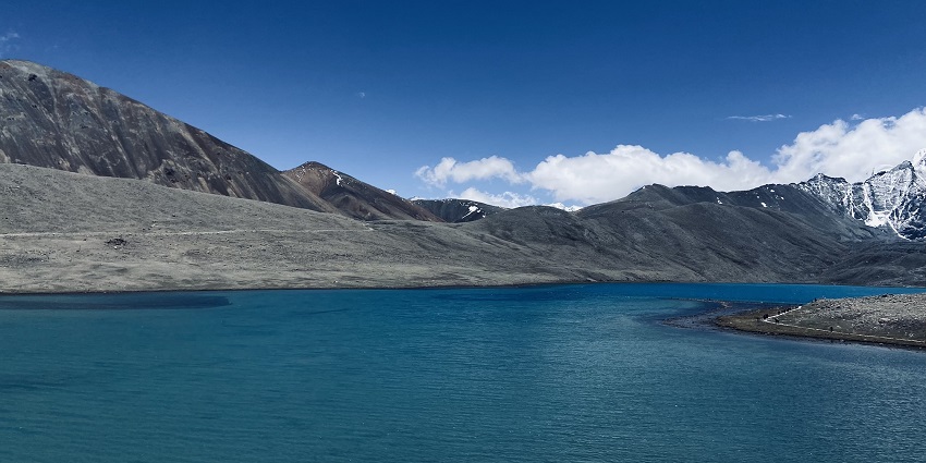 Gurudongmar Lake in North Sikkim with low mountains and peaks covered with snow under white clouds.
Viewers of this file can see comments and suggestions