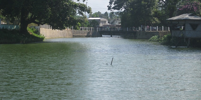 An image of Haflong Lake, one of the freshwater lakes in Assam, India, surrounded by greenery.