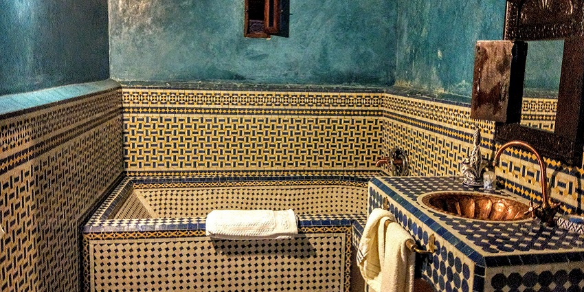 Traditional Moroccan bath offering relaxation with steam and cleansing rituals.