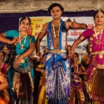 Hampi Utsav in Karnataka—Image of dancers performing in a group in Hampi Festival