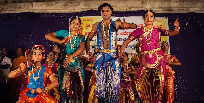 Hampi Utsav in Karnataka—Image of dancers performing in a group in Hampi Festival