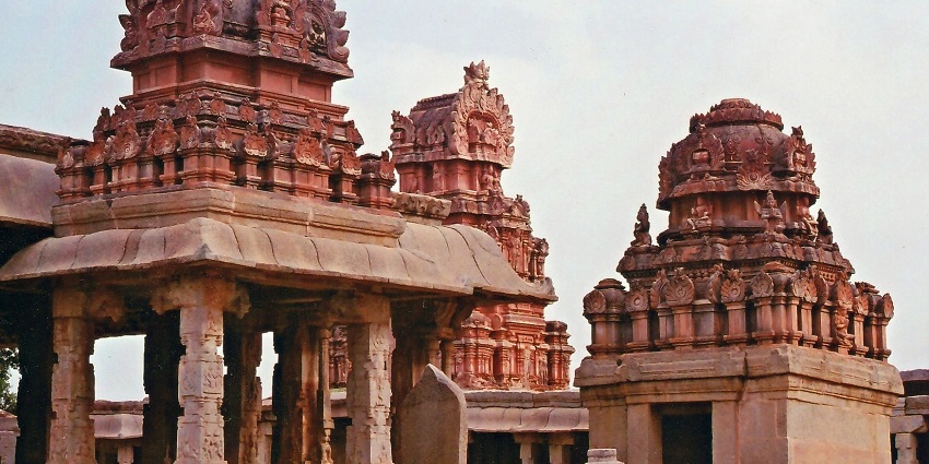 An image showing the Krishna Temple at Hampi, featuring intricate carvings and ancient architecture.