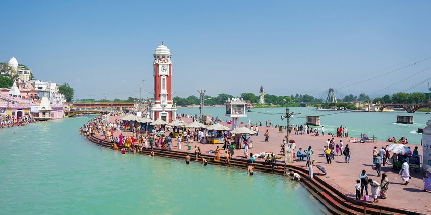 An image of the river Ganges in Haridwar, one of the best places to go in March.