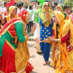 An image society women dancing during celebration of Baisakhi in Punjab with traditional dances