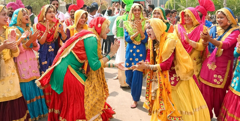 An image society women dancing during celebration of Baisakhi in Punjab with traditional dances