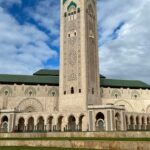 The towering minaret Hassan II Mosque overlooks the Atlantic with stunning architecture.