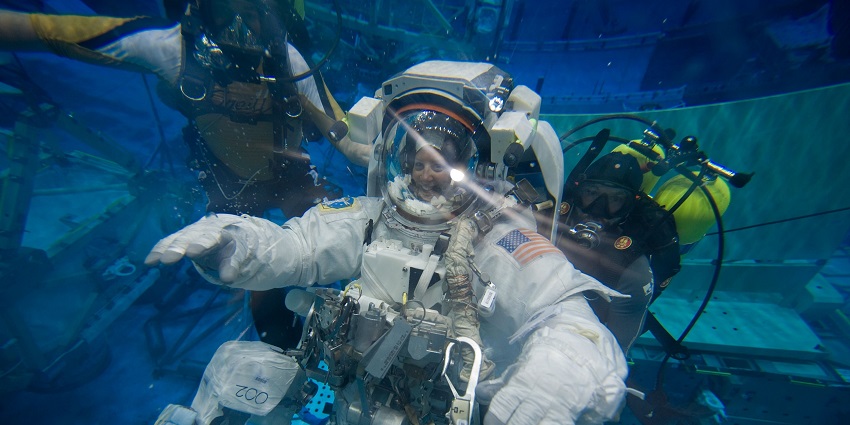 Underwater experience where you walk among marine life with a helmet