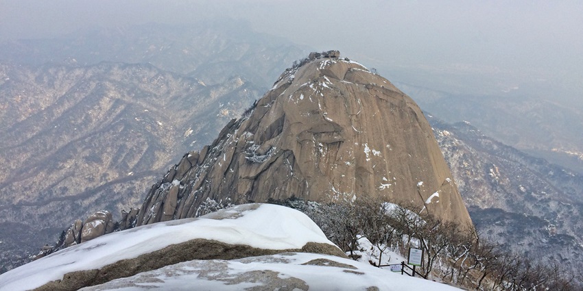 Things to do at Bukhansan National Park include a challenging hike with stunning panoramic mountain views.