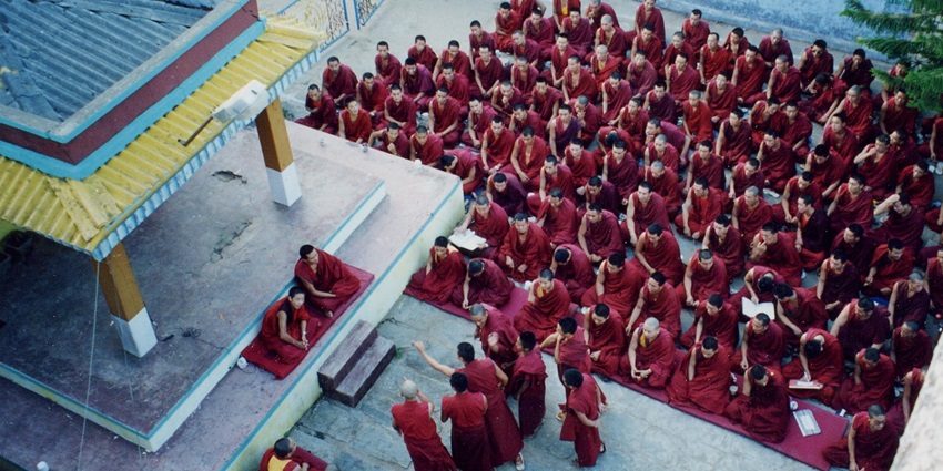 An image capturing a teaching session at Sera Jey Monastery in Bylakuppe, India.