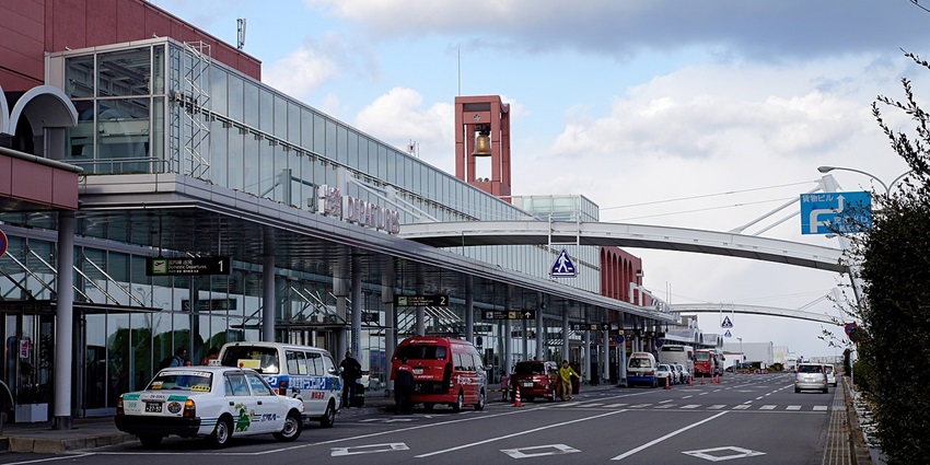 Nagasaki Airport (NGS) main entrance, showcasing its modern structure and transport access.