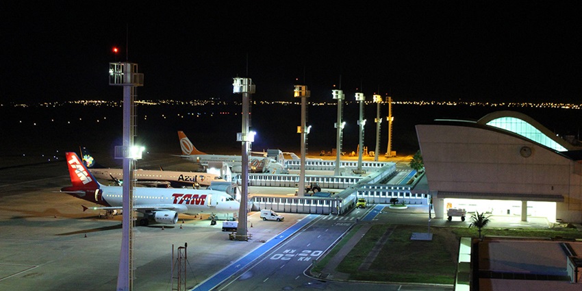 An image of night view of Ile des Palmes Airport with multiple flights on standby