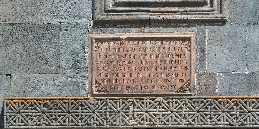 Ancient architecture and scriptures of Geghard Monastery.