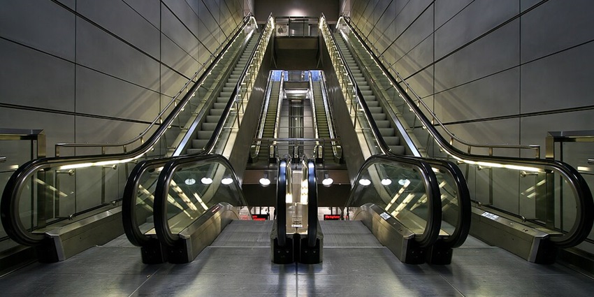 Image of an automatic escalators inside the metro stations near Picasso Museum