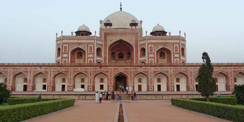 The entrance of the beautiful Humayun’s tomb with greenery around located in Delhi.