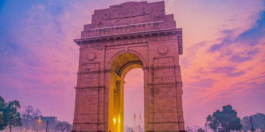 The picture of the campus inside the India Gate with a small pond located in Delhi, India.