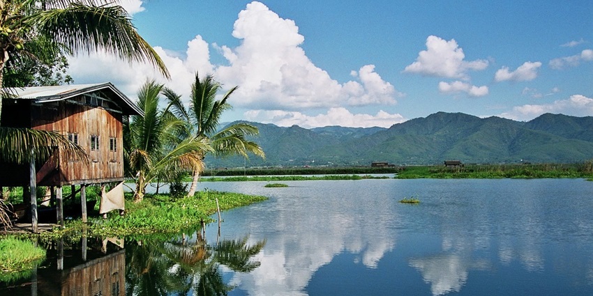 Inle lake with a still large water body reflecting the clouds - one of the lakes in Asia.