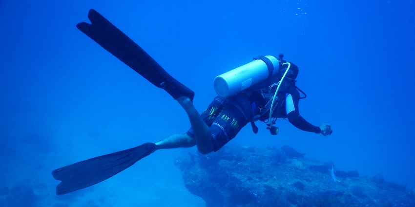 Scuba diving in Cuba at the island with hidden caves, and coral reefs